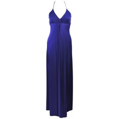 This Elizabeth Mason Couture gown is composed of a purple silk jersey and features a draped design. There is a halter style neckline. This effortlessly chic gown can be styled in a variety of fashions. Made in Beverly Hills. The gown may be fashioned in a variety of colors. This is a couture custom order. Please allow for a 60 day lead time from measurements, fabric selection, patterning, toile fitting, to final product. The dress shown is a sample size 2. The sample is not for purchase. Measurements of sample size: Length: 56" Bust: 29" Waist: 28" Hip: 42" Gowns Purple, Purple Evening Gowns, Gown Purple, Purple Gown, Halter Evening Dress, Draped Gown, Blue Halter Dress, Blue Evening Gowns, Gown Blue