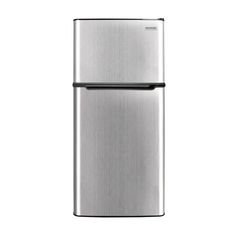 a silver refrigerator freezer sitting on top of a white wall