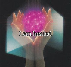 someone holding their hands together with the words i am healed in front of them