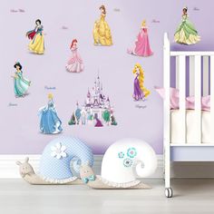 the princess wall decals are on display in this child's room with purple walls