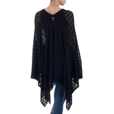 You'll be the hit of the party in this knit poncho by Peruvian artisan Alfredo Falcon. The artisan uses a touch of famously soft baby alpaca (the fleece acquired from the first shearing of the season) for this design. The poncho features a V-neck and a unique diamond knit. The poncho's angled cut makes for a flattering silhouette. 90% acrylic, 10% baby alpaca Do not bleach Lay flat to dry One size fits most Machine wash in cold water Handmade in Peru Cardigan Plus Size, Batwing Sweater, Poncho Cardigan, Knit Poncho, Poncho Cape, Plus Size Sweaters, Knitted Poncho, Sweater Women, Boho Casual