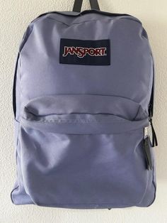 This JanSport backpack is perfect for any stylish man on-the-go. The light blue and grey color combination offers a sleek and modern look that is sure to turn heads. With ample space for all your essentials, this backpack is both practical and fashionable. Crafted from high-quality materials, this backpack is built to last. The JanSport brand is synonymous with quality and this backpack does not disappoint. Whether you're heading to work, running errands, or exploring the city, this backpack is the perfect accessory to complete any outfit. Stylish Man, Light Backpack, Blue And Grey, Jansport Backpack, Backpack Purse, Grey Color, Color Combination, Stylish Men, Running Errands