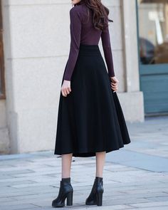 * A high-end long wool skirt with wide hem, very cool. * Made of wool blends, fully lined and with two side pockets. * Fixed waist with wide waistband and side invisible zipper. * Can custom make waist size and skirt length. * Material: Outer-50% wool, 50% polyester; lining-100% polyester * Washing instructions: Dry Clean Only * Size: True to US size, US 0-US 14 are available, you can let us know your usual size and height in your order. * Shipping: Free shipping Processing time : 5-7 Business d Black A-line Maxi Skirt For Winter, Formal Flared Pleated Skirt For Winter, Winter Evening Midi Skirt, Chic A-line Maxi Skirt For Winter, Long Black Pleated Winter Skirt, Fall Pleated Maxi Skirt, Formal Winter Midi Skirt, Fall Midi Length Pleated Maxi Skirt, Formal Midi Skirt For Winter