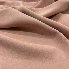 Powder Pink Italian Crepe Fabric, Fashion Fabric, Clothing Fabric, Dress-Blouse-Skirt-ShirtFabric, Sewing Fabric(150 cm or 1.64 yards or 57 inch) Introducing our exquisite Powder Pink Italian Crepe Fabric! This versatile fabric is perfect for fashion enthusiasts and seamstresses alike. Crafted from high-quality materials, it's ideal for creating a variety of clothing pieces including dresses, blouses, skirts, and shirts. With a width of 150 cm (or approximately 57 inches), you'll have plenty of Elegant Skirt, Beautiful Drapes, Rock Shirts, Crepe Fabric, Powder Pink, Stylish Shirts, Fashion Fabric, Blouse And Skirt, Blouse Dress