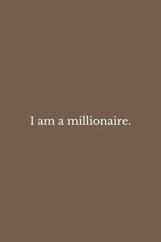 the words i am a millionaire are written in white ink on a brown background