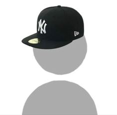 the new york yankees'black and white logo is shown on a baseball cap with shadow