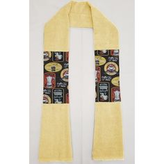 a yellow scarf with beer labels on it