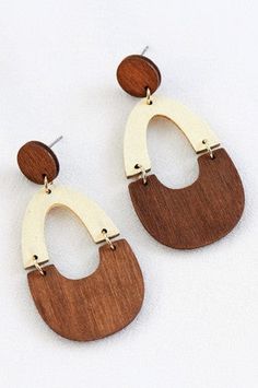 Elevate your look with our Reed's Wooden Teardrop Earrings! Handcrafted from lightweight wood, these bohemian-inspired earrings feature intricate laser cut details, adding unique charm to any outfit. Experience effortless style and all-day comfort with our dangle teardrop design. A must-have for every jewelry collection! Wooden Teardrop Earrings, Denim Chambray Dress, Comfort Gifts, Chain Lanyard, Chambray Dress, Boutique Tops, Accessories Jewelry Necklace, Elevate Your Look, Kimono Jacket