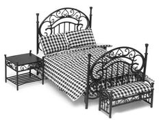 a black and white checkered bedspread with matching footstool, night stand and end table