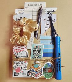 an assortment of school supplies tied to a bulletin board