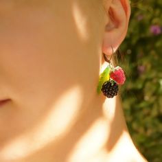 "These Blackberry & raspberry earrings glass fruit earrings dangle are good for casual outfits and for special occasions. Unique nature berry food earrings can be a great gift for mom birthday or a lovely treat for you! Dimensions: total length 1.6\" inch (4.2 cm). Materials: artist lampwork beads, metal fittings. Colors used: crimson, pink, purple, black, green. Please note, each bead is made by hand and may differ slightly. Please note that color is displayed differently on different screens, Cute Berry Colored Jewelry With Fruit Design, Cute Berry-colored Jewelry With Fruit Design, Cute Berry-colored Fruit Design Jewelry, Berry Colored Fruit Design Earrings For Gift, Berry-colored Fruit Design Earrings For Gift, Berry Colored Fruit Design Jewelry Gift, Blackberry Earrings, Raspberry Earrings, Berry Earrings