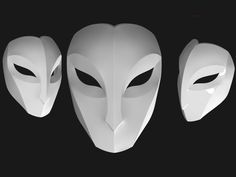 three white masks with black background