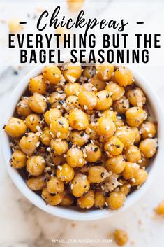 chickpeas in a white bowl with sesame seeds on top and text overlay that reads, chickpeas everything but the bagel seasoning