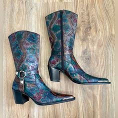 Basic Di Paoovan Made In Italy One Of A Kind Stunning Cowboy Boot Size 8.5 (39) Introducing The Exquisite Basic Di Paoovan Cowboy Boots, Crafted With Exceptional Artistry In Italy. These One-Of-A-Kind Boots Are A Size 8.5 (Eu 39) And Feature A Breathtaking Floral Design That Sets Them Apart From Any Other Cowboy Boots On The Market. The Attention To Detail And Superior Craftsmanship Are Evident, Making Them A True Testament To Italian Shoemaking Traditions. Whether You're A Cowboy Boot Enthusiast Or Simply Appreciate Well-Made Footwear, These Boots Are Sure To Impress With Their Unique Blend Of Style And Quality. *Like New The Stunning Floral Pattern, Meticulously Embroidered On The Boots, Unique Cowboy Boots, Unique Boots, High Quality Boots, Cowboy Boot, Source Unknown, Shoes Heels Boots, Cowboy Boots, Fashion Statement, Shoes Women Heels