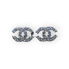 the chanel logo brooch is made out of crystal stones