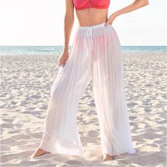 Ocean Breeze Not Included, But Highly Recommended! These Billowy Cover-Up Pants Pull Easily Over Your Suit, Then Secure At The Waist With Elastic And Drawstring. Sheer Fabrication Showcases A Hint Of The Suit Underneath While Pleats Add A Touch Of Texture To The Soft, Feminine Fit. Size: L (12-14) Very Loose Fit Sheer Coverage Mid-Rise Elastic Waistband With Drawstring Flared Leg Poly. Imported Includes Gift Box/Wrap Box Wrap, Racerback Swimsuit, Pink Bathing Suits, Transparent Dress, Beach Coverup Dress, Maxi Tops, Black Bathing Suits, Patiala Salwar, Soft Feminine