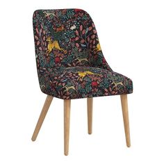 an upholstered chair with wooden legs and a colorful fabric seat cover on it