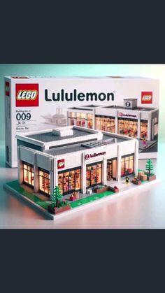 a lego model of a store with its lights on