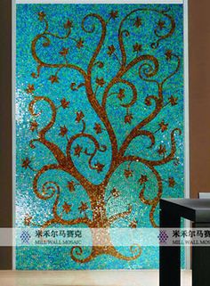 a glass painting with a tree and stars on the bottom is shown in front of a table