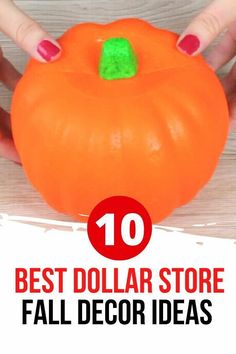 a hand holding an orange pumpkin with the words 10 best dollar store fall decor ideas