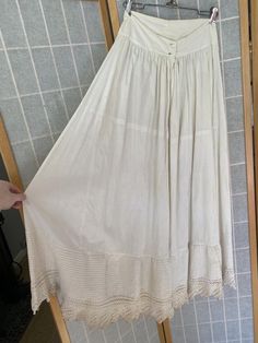 Late 1800’s white cotton skirt with crocheted hem. Has many many stains, on the hem and body of the skirt. Being sold as isWaist: 25.5”Waist to hem: 38” Cotton Petticoat With Gathered Skirt For Daywear, Vintage White Skirt With Attached Cancan, Summer Cotton Skirt With Attached Cancan, Vintage Tiered Petticoat With Lined Skirt, Vintage Long Ruffled Petticoat, Vintage Full Skirt In Crinoline, Vintage Crinoline Petticoat For Spring, Spring Vintage Crinoline Petticoat, Summer Vintage Crinoline Petticoat