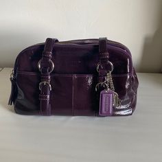 Purple Coach Bag That Is Like Brand New. There Is Just A Small Stain On The Inside Of The Bag That Is Shown In The Picture. This Comes With A Matching Wallet! Coach Purple Bag, Purple Coach Bag, Purple Bag Aesthetic, Purple Bag Outfit, Cool Purses, Fall Purses, Purple Products, 2000s Purse, Lavender Purse