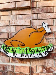 a sign on the side of a brick building that says, please have peace for my chickens