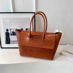 Introducing our stunning Luxury Crocodile Pattern Handbag, the perfect accessory for chic and sophisticated women. Made with high-quality leather and featuring a trendy crocodile pattern, this bag is not only fashionable but also durable and long-lasting. Trending Totes, Winter Typ, Woven Tote Bag, Handbag Patterns, Handbag Women, Handbags Tote, Bag Trends, Shoulder Tote Bag, Black Coffee