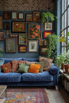 a living room filled with furniture and lots of pictures hanging on the wall above it