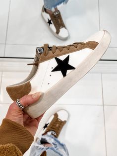 Your Favorite Neutral Star Sneaker

Make it a star-studded affair in these "Your Favorite Neutral Star Sneakers", comfy enough to take you from day to night with ease! Featuring a vegan blinded leather and an oh-so on-trend cognac brown hue, plus a rubber outsole, lace up closure, and a black star on the sides, these sneaks will make sure you're always looking stellar. Kandy, Smiles And Laughs, Lace Up Sneakers, Star Sneakers, Military Discounts, Black Star, Phoenix Az, Leather Lace, Stylish Sneakers