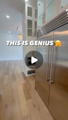 a stainless steel refrigerator in a kitchen with the words, this is genius on it