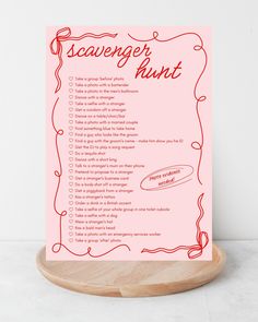 a pink scavenger print on a wooden stand