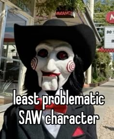 a person wearing a creepy mask with the words, least prolematic saw character