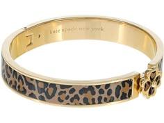 Kate Spade New York Heritage Spade Leopard Hinged Bangle - Bracelet : Multi 2 : Embrace your inner wild side in the Kate Spade New York Heritage Spade Leopard Hinged Bangle with a patterned enamel with shiny metal and a spade-flower-shaped push-clasp hinge for a bangle unlike the rest. Gold and enamel construction. Turn and click clasp closure. Presentation bag is included. Imported. Measurements: Width: 2 5 in Diameter/Length: 7 in Weight: 1.34 oz Leopard Bracelet, Kate Spade Bracelet, Body Jewelry Piercing, Stacked Jewelry, Jewelry Lookbook, Girly Jewelry