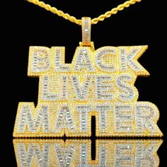 New Icy Supreme Quality 14k Bi-Color Gold Finish Black Lives Matter Pendant Over Brass Dipped In Gold 5xtimes To Include A Free 14k Yellow Gold Finish 24inch X 3mm Rope Chain For Men. * Icy Black Lives Matter Pendant * Supreme Quality & Dipped In Gold 5xtimes * 14k Bi-Color Gold Finish X5 * Over Brass * Simulated Diamonds * Micro Pave Setting * Pendant Length: 2.75 Inch * Pendant Width: 2.9 Inch * So Icy You Have To See To Believe. * Free Rope Chain * 14k Yellow Gold Finish * Over Stainless Stee Celebrity Style Jewelry, Buddhist Necklace, Stainless Steel Wedding Bands, Ruby Necklace Pendant, Black Gold Ring, Hemp Leaf, Expensive Jewelry Luxury, Chain For Men, Black Bead Necklace