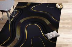 a black rug with gold swirls on the floor and a white chair next to it