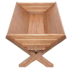 a wooden table with two crossed legs and a square shaped tray on the top that is made out of wood