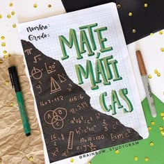 a notebook with some writing on it next to a pen and paper that says mate maif cas