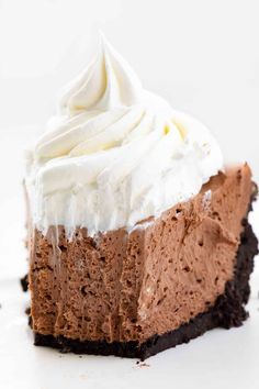 a piece of chocolate pie with whipped cream on top