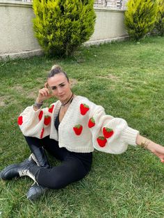 This handmade thick warm beige red strawberry trendy cropped cardigan is made for women. You can wear it in spring, autumn. Made of 50% merino wool. Warm, soft, thick knit from thick yarn. about 47cm/18.5 inch Wide size 60 cm/23.6 inches. SUITABLE SIZES M - L - XL Women's cropped oversize cardigan "strawberry" in 50% merino wool. Voluminous sleeves, hand-knitted from thick yarn, eco-friendly, stylish, warm, pleasant to the touch. That's why this cardigan is called the "strawberry cardigan". You Strawberry Cardigan, Knitting Jacket, Oversize Cardigan, Handmade Sweater, Voluminous Sleeves, Crop Cardigan, Warm Beige, Thick Yarn, Sweater For Women