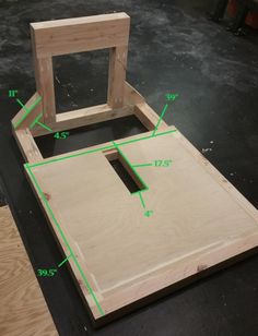 an unfinished chair with measurements for the seat