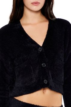 Knit cardigan sweater featuring fuzzy textured construction, button - front closures, V - neckline, front patch pockets, and long sleeves. | 100% nylon | Hand wash cold | Model is 5'7" and wearing Small | Fuzzy Cardigan Sweater Trendy Long Sleeve Cardigan From Forever 21, Black Fur Cardigan, Black Fuzzy Cardigan, Black Ribbed V-neck Cardigan, Black V-neck Textured Knit Cardigan, Fuzzy Cardigan, Rib Knit Cardigan, Knit Sweater Cardigan, Knit Cardigan