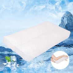 an image of a pillow that is in the water with ice cubes around it