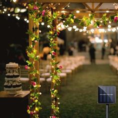 an outdoor wedding venue decorated with flowers and greenery