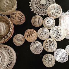 several baskets and doily on a table