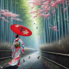 a woman holding an umbrella walking down a path