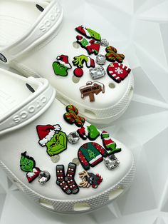 Grinch crocs charms . Christmas humor charms .Personalize you Crocs or Croc-like shoes and silicone bracelets with these stylish shoe charms. How to order. List the alphabet at the top of each charm in the personalization tab. Each charm is *Individually sold. Shoes are not included! Size: Varies between each charm. Measures about 1.5-1.5 inches. EASY INSTALL: Slightly stretch the hole of your croc with your finger, insert charm, then release and you're all set! Payment Info: No Refund/exchanges Shoes Aesthetic Crocs, Christmas Crocs Shoes, Christmas Croc Charms, Crocs With Charms Ideas, Stuff To Get For Christmas, Christmas Sweatshirt Ideas, Crocs Charm