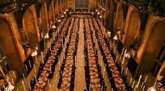 an overhead view of a dining hall with long tables