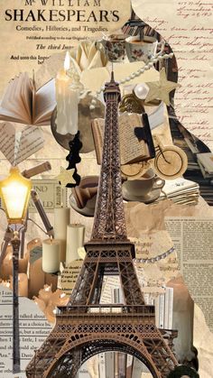 the eiffel tower is surrounded by old papers and other things that are on display