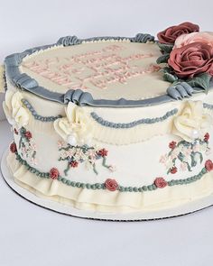 a decorated cake with flowers on it